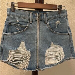 Carmar distressed denim zip up skirt